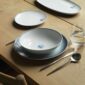 Royal Copenhagen Blueline Dinnerware set on table | Kneen & Co