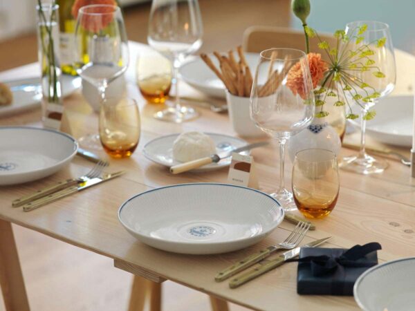 Royal Copenhagen Blueline Dinnerware set on table | Kneen & Co