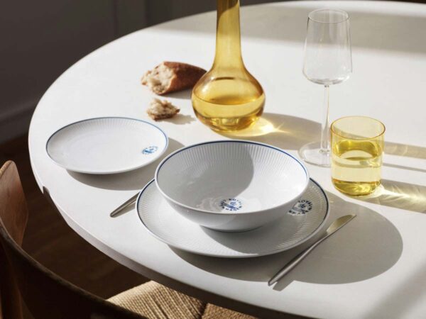 Royal Copenhagen Blueline Dinnerware set on table | Kneen & Co