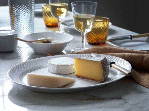 Royal Copenhagen White Fluted Dinnerware set on table | Kneen & Co
