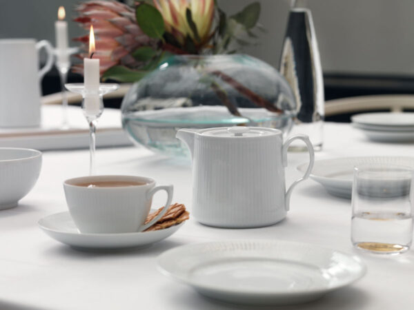 RC-Tablesetting-WhiteFluted-Page55-1200w-100KB Royal Copenhagen White Fluted Tea Service set on table | Kneen & Co