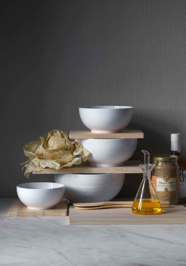 RC-WhiteFluted-Bowls-4-pcs-Tall-1200w-100KB White Fluted Dinnerware set bowls on table | Kneen & Co