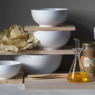 RC-WhiteFluted-Bowls-4-pcs-Wide-1200w-100KB Royal Copenhagen White Fluted Dinnerware set bowls on table | Kneen & Co