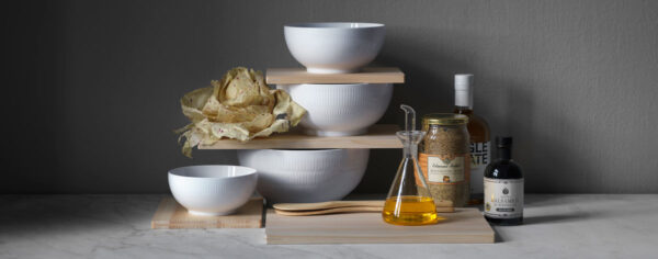 Royal Copenhagen White Fluted Dinnerware set bowls on table | Kneen & Co