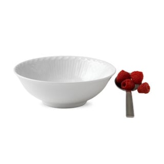 RoyalCopenhagen-1017288-WHITE-FLUTED-HL-BOWL-40CL-01-1200×1200-100KB Royal Copenhagen White Fluted Half Lace Cereal Bowl shown on table | Kneen & Co