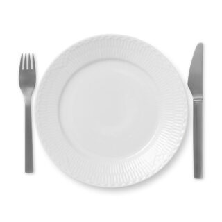 RoyalCopenhagen-1017294-WHITE-FLUTED-HL-PLATE-22CM-01-1200×1200-100KB Royal Copenhagen White Fluted Half Lace Salad Plate shown on table | Kneen & Co