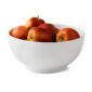 Royal Copenhagen White Fluted Serving Bowl shown on table | Kneen & Co