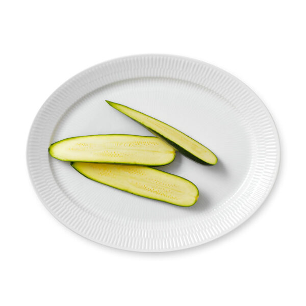 Royal Copenhagen White Fluted Oval Serving Dish shown on table | Kneen & Co