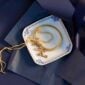 Royal Copenhagen Princess Square Assiette set on table with jewelry | Kneen & Co
