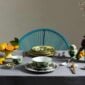 Ginori 1735 Oriente Italiano assorted dinnerware set on table | Kneen & Co
