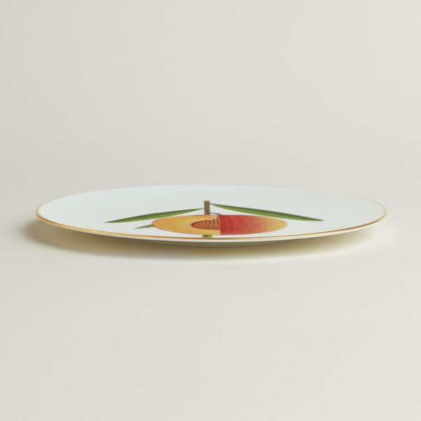 Hermès Kaorumi Dessert Plate – Nectarine shown on table | Kneen & Co