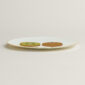 Hermès Kaorumi Dessert Plate – Kiwi shown on table | Kneen & Co