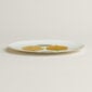 Hermès Kaorumi Dessert Plate – Lemon shown on table | Kneen & Co