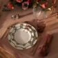 Royal Copenhagen Star Fluted Christmas DInnerware set on table | Kneen & Co