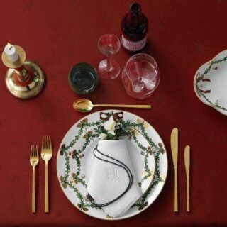 RC-Star-Fluted-Christmas-Page-92-93-1200w-100KB Royal Copenhagen Star Fluted Christmas DInnerware set on table | Kneen & Co