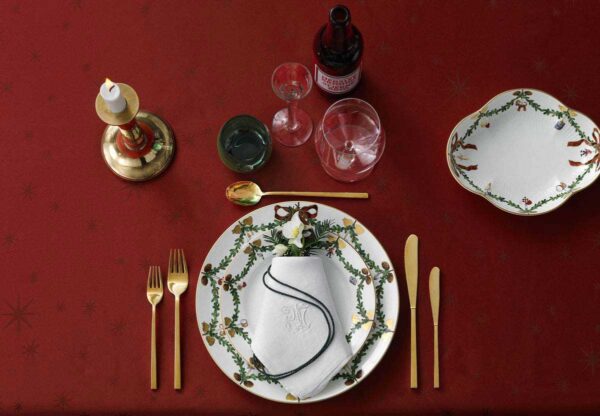Royal Copenhagen Star Fluted Christmas DInnerware set on table | Kneen & Co