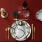 Royal Copenhagen Star Fluted Christmas DInnerware set on table | Kneen & Co