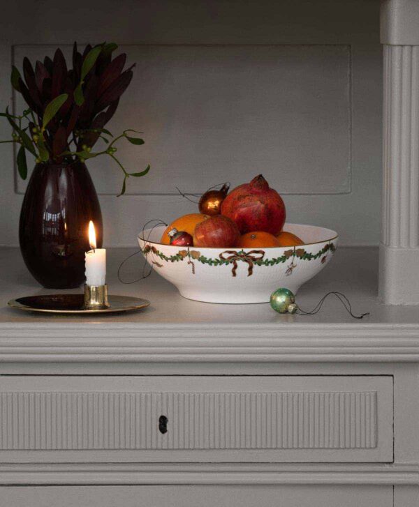 Royal Copenhagen Star Fluted Christmas DInnerware set on table | Kneen & Co