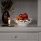 Royal Copenhagen Star Fluted Christmas DInnerware set on table | Kneen & Co