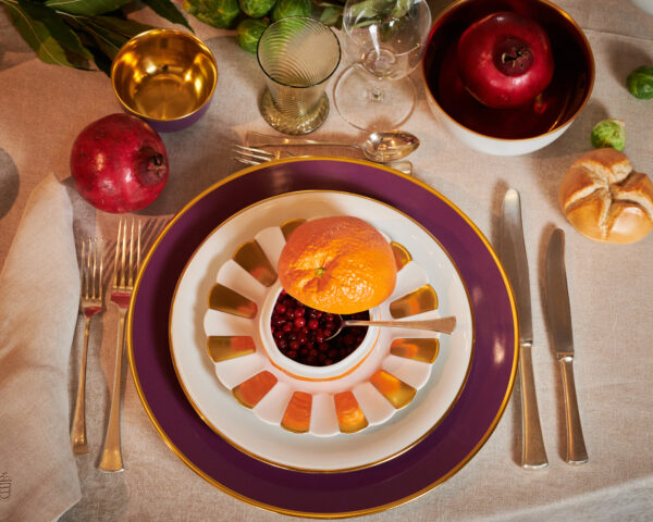 Augarten assorted dinnerware set on table | Kneen & Co