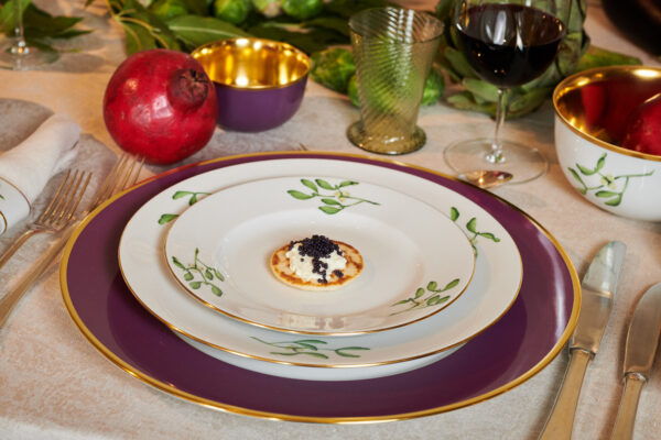Augarten assorted dinnerware set on table | Kneen & Co