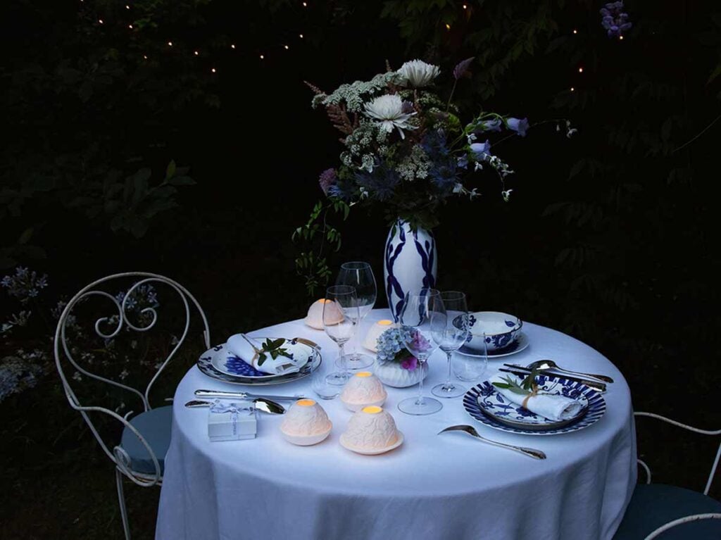 Bernardaud Votive Lights set on evening table | Kneen & Co