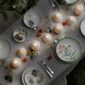 Bernardaud Votive Lights set on evening table | Kneen & Co