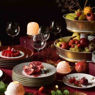 Bernardaud Votive Lights set on evening table | Kneen & Co