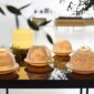 Bernardaud Votive Lights set on evening table | Kneen & Co