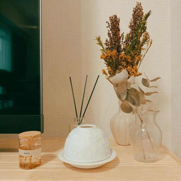 BernardaudVOTIVE-Lights-MOOD-24331-04-UGC-mmm-r-910x910-1200w-100KB Bernardaud Votive Lights set on side table | Kneen & Co