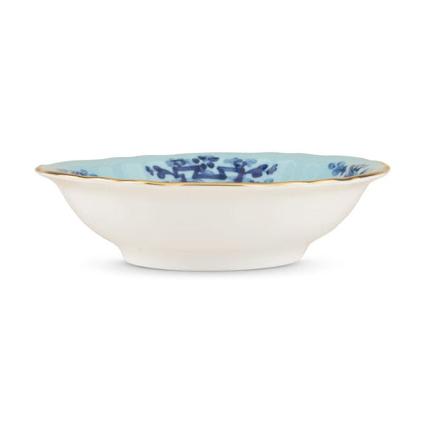 Ginori 1735 Oriente Italiano Iris Fruit Bowl shown on table | Kneen & Co