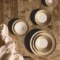 Bernardaud Ecume Mordoré Dinnerware set on wood table | Kneen & Co