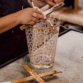 BAOBAB-MAX10WOM-Women-Craftmanship-1200w-100KB Craftsmanship workshop setting with Baobab Women Candle Max 10 in delicately printed glass with 24-carat yellow gold | Kneen & Co