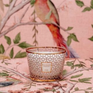 BAOBAB-MAX10WOM-Women-Lifestyle-1200w-100KB Elegant lifestyle setting with Baobab Women Candle Max 10 in delicately printed glass with 24-carat yellow gold | Kneen & Co