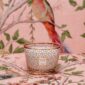 Elegant lifestyle setting with Baobab Women Candle Max 10 in delicately printed glass with 24-carat yellow gold | Kneen & Co