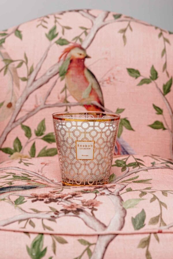 Elegant lifestyle setting with Baobab Women Candle Max 16 in delicately printed glass with 24-carat yellow gold | Kneen & Co