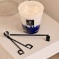 Minimalist indoor setting with Baobab Collection candle accessories and Baobab candle in blue and white glass | Kneen & Co