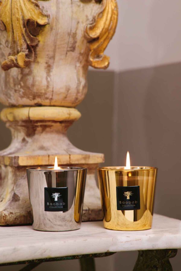 BAOBAB-SS2026-PRIORITIES-MENERBES-62-1200w-100KB Sophisticated interior setting with Baobab Aurum and Platinum Les Exclusives Candle Duo in metallic gold and silver glass | Kneen & Co