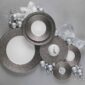Festive flat lay of Bernardaud Écume Platinum Dinnerware in a textured platinum and white finish | Kneen & Co