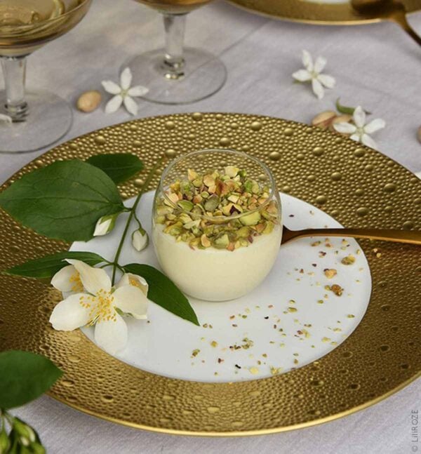 Elegant table setting with Bernardaud Écume Gold plate in a textured gold and white finish | Kneen & Co
