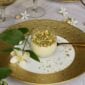 Elegant table setting with Bernardaud Écume Gold plate in a textured gold and white finish | Kneen & Co