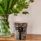 Warm interior setting with Baobab Collection Sacred Trees Morondo candle in sublimated glass with intricate brown tree pattern | Kneen & Co