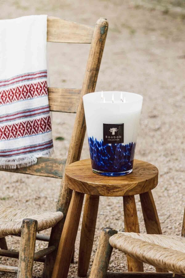 MAX16FT-Feathers-Touareg-Lifestyle-2-1200w-100KB Baobab Feathers Touareg Scented Candle Max 16 | Kneen & Co Lifestyle photo on beach.