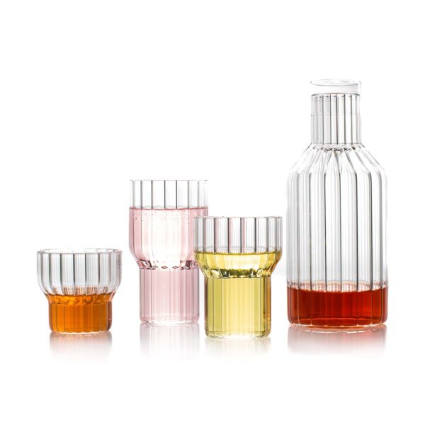Minimalist white studio arrangement of Fferrone Boyd Glassware and carafe in fluted borosilicate glass | Kneen & Co