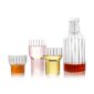 Minimalist white studio arrangement of Fferrone Boyd Glassware and carafe in fluted borosilicate glass | Kneen & Co