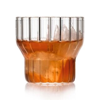 Minimalist white studio background with Fferrone Boyd Small Glass in fluted borosilicate glass | Kneen & Co