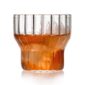 Minimalist white studio background with Fferrone Boyd Small Glass in fluted borosilicate glass | Kneen & Co