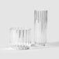 Minimalist light grey studio background with Fferrone Dearborn glasses, featuring the Wine Glass and Champagne Flute in fluted borosilicate glass | Kneen & Co