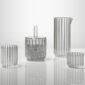 Minimalist white studio arrangement of Fferrone Dearborn Glassware in fluted borosilicate glass | Kneen & Co