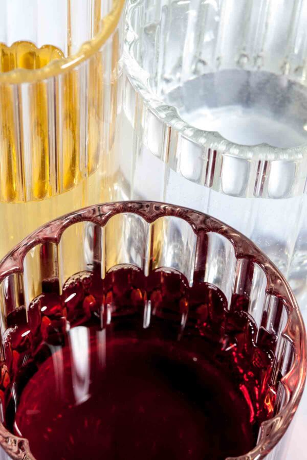 Extreme close-up detail shot of Fferrone Dearborn glassware in fluted borosilicate glass, highlighting the rim texture and light refraction | Kneen & Co